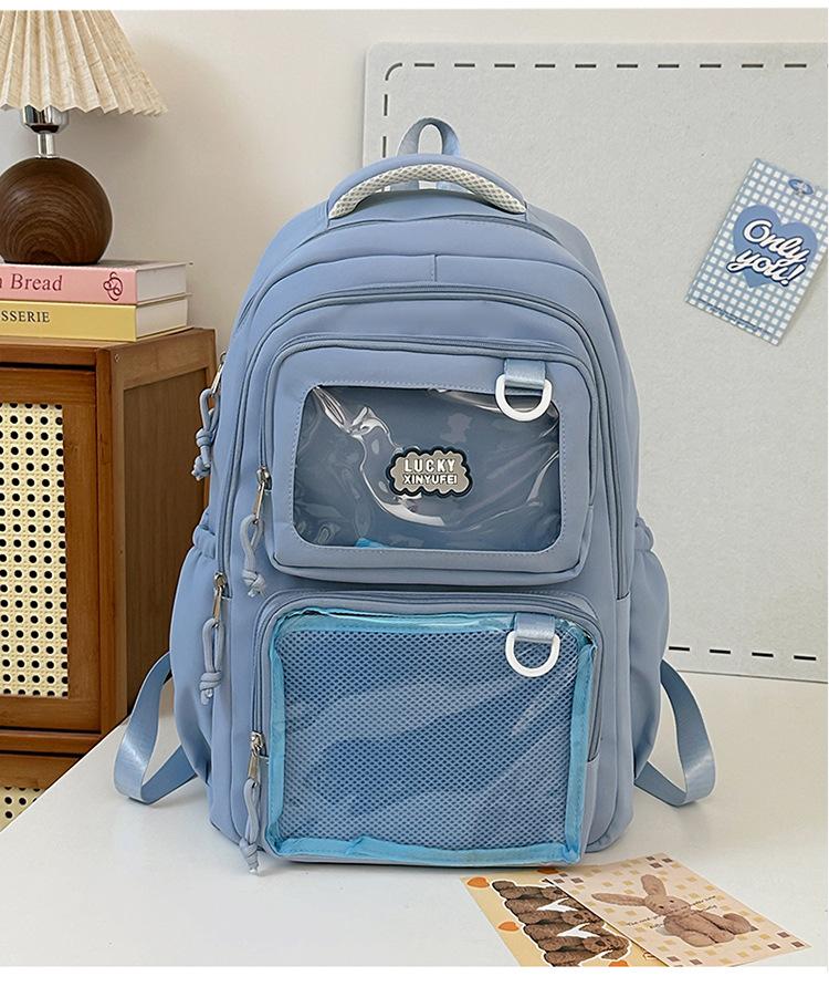 

Transparent badge Solid color Junior high school student backpack Women s fashion schoolbag Student girl backpack синій