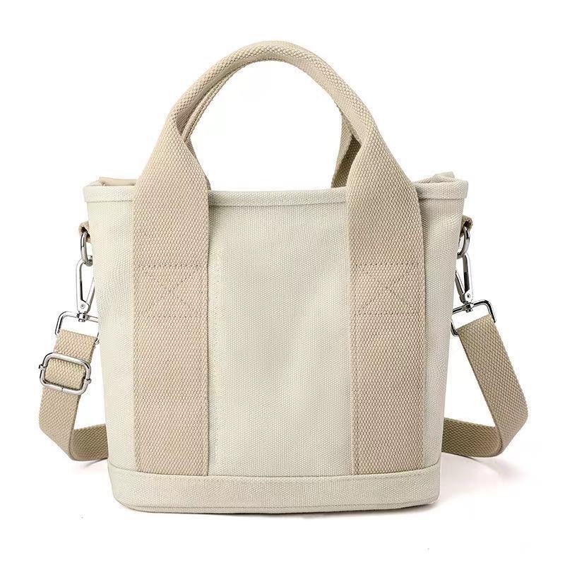 Canvas bag Portable messenger bento bag Large capacity bag Fashion trend One shoulder messenger women's bag