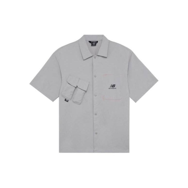 

Мужская однотонная рубашка поло New Balance с логотипом, серая AMJ22360-SDE