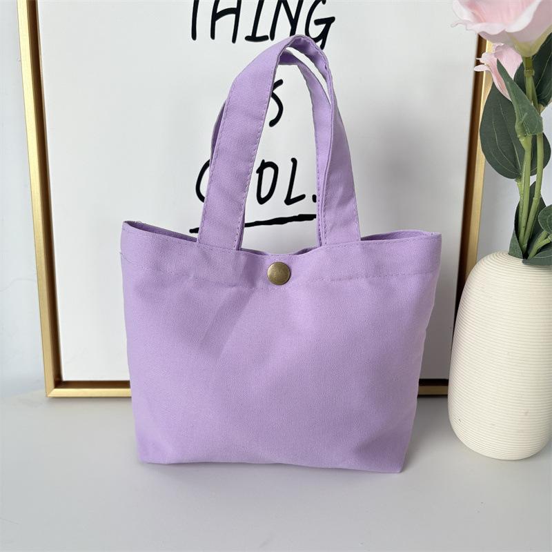 Effenkleurige eenvoudige lunchtas, draagbare canvas tas, kleine stoffen tas, draagbare canvas tas voor het opbergen van diverse spullen