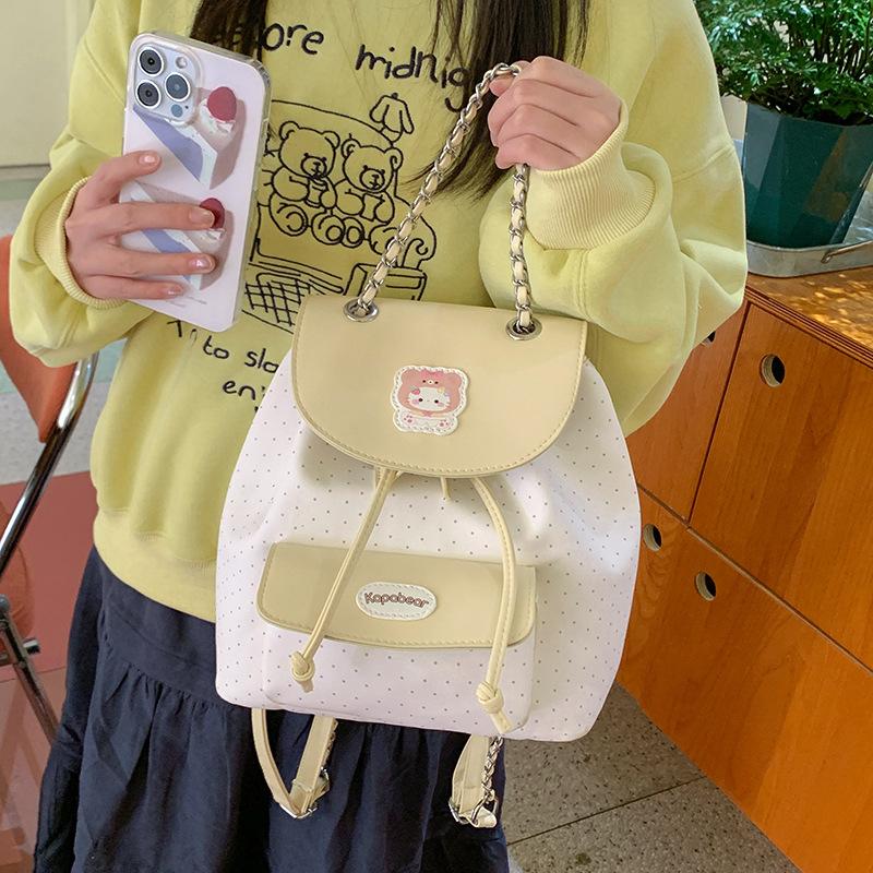 High-value girls toilet bag, simple casual small backpack, cute bow floral college style flip backpack.