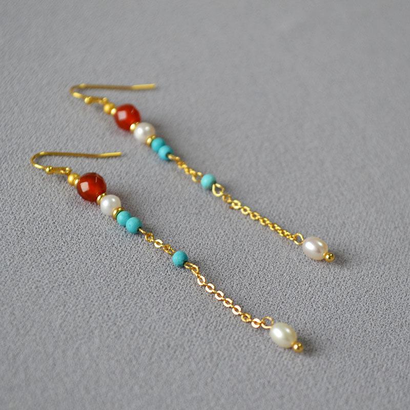 

Длинное ожерелье Niche Design с кисточками из пресноводного барочного агата и двухслойными бусинами