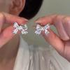 Exquisite High-End Zirconia Bow Stud Earrings with S925 Sterling Silver Needle - Light Luxury Niche Design.