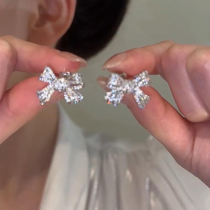 Exquisite High-End Zirconia Bow Stud Earrings with S925 Sterling Silver Needle - Light Luxury Niche Design.