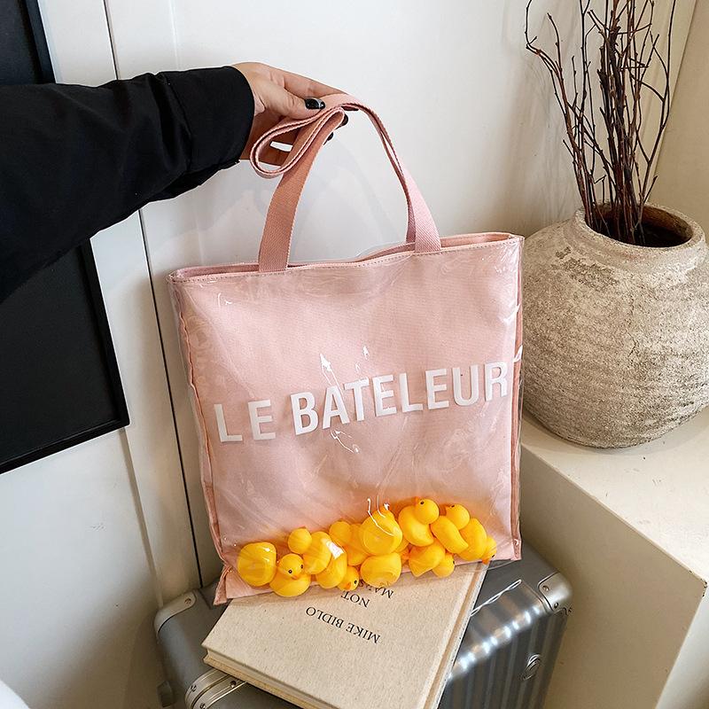 

Summer jelly transparent bag 2025 new Japanese girl cute duckling doll large capacity shoulder bucket bag