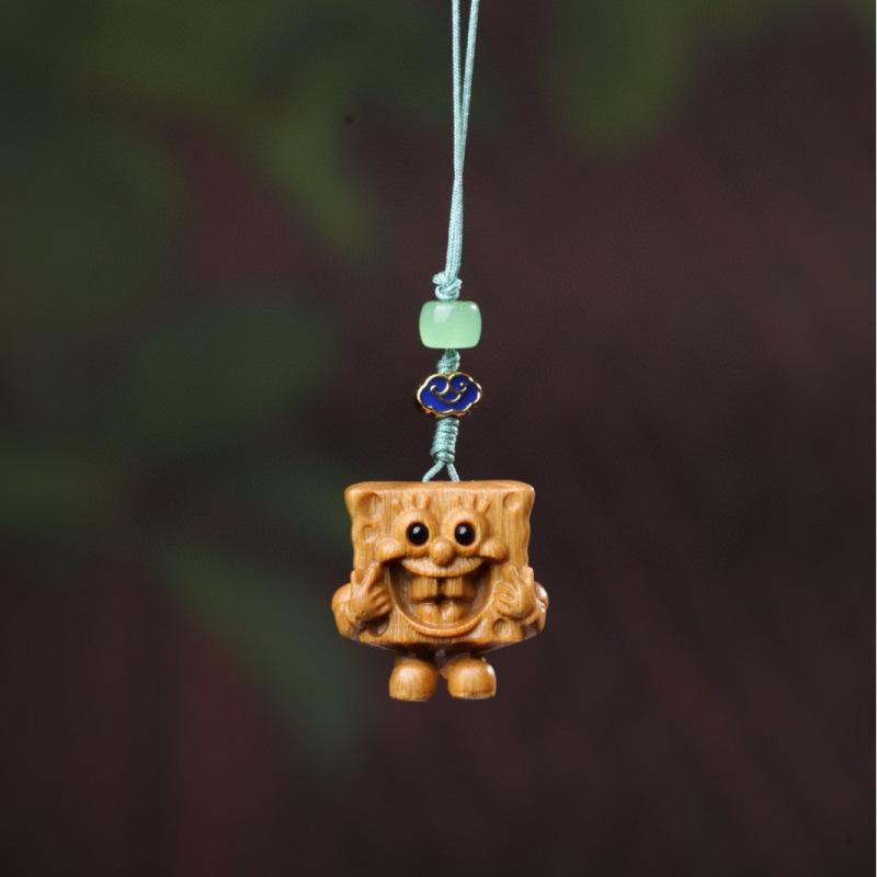 Twelve Zodiac Animal Charms Green Sandalwood Set: Rat, Ox, Tiger, Rabbit, Dragon, Snake, Horse, Sheep, Monkey, Rooster, Dog, Pig.