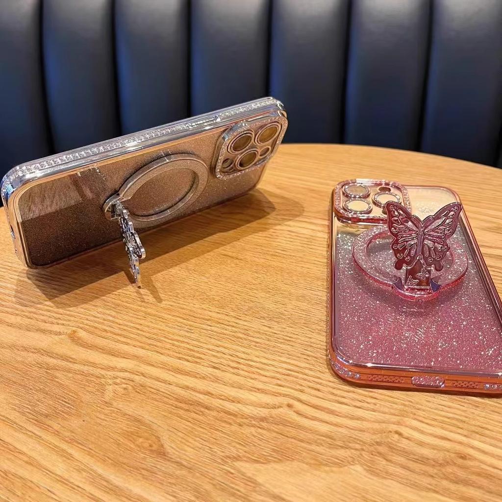 Anwendbar auf IPhone 16 Strass Glitzer Schmetterling Ständer Handyhülle Magnetische Saugkraft Apple 15 ProMax Sturzsichere Schutzhülle