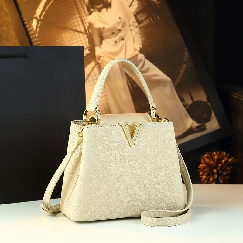 Popular High-grade Leather Women Handbags Small Portable Bucket Bag 2025 New Niche Design Commuter Crossbody Mother Bags