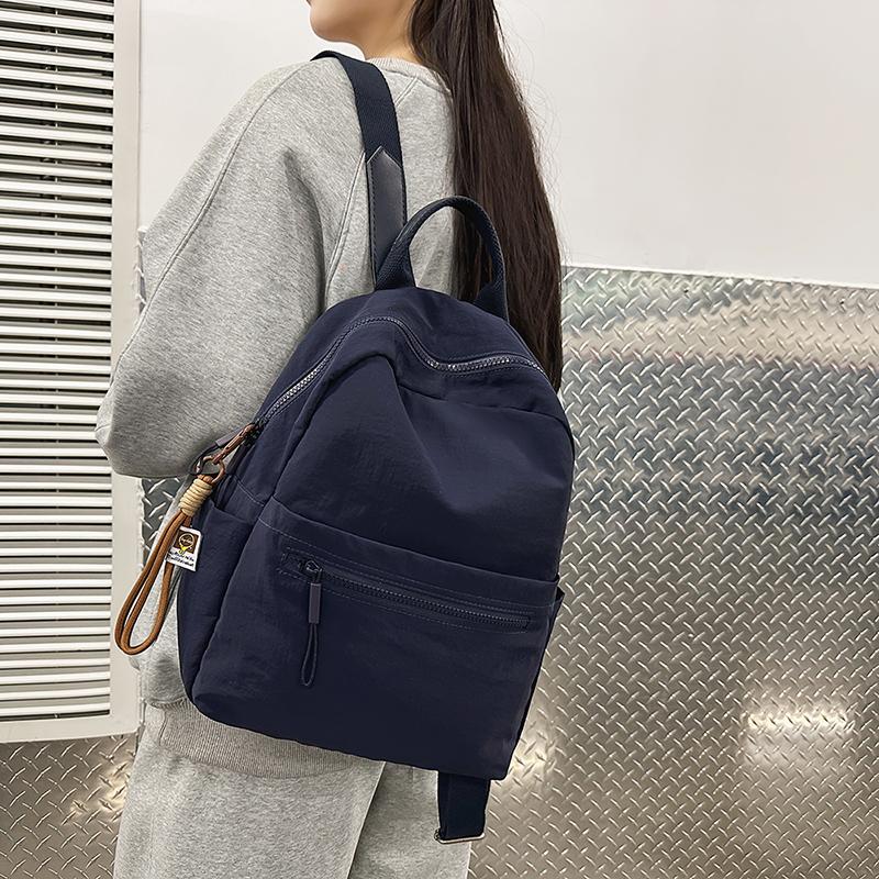 Školní batoh ve stylu college Dámský jednobarevný velkokapacitní batoh na dojíždění Pánský lehký batoh