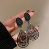 Silver Needle Retro Temperament Hollow Pattern Water Drop Earrings Female, Black Metal Cold Wind Exaggerated Earrings Earrings