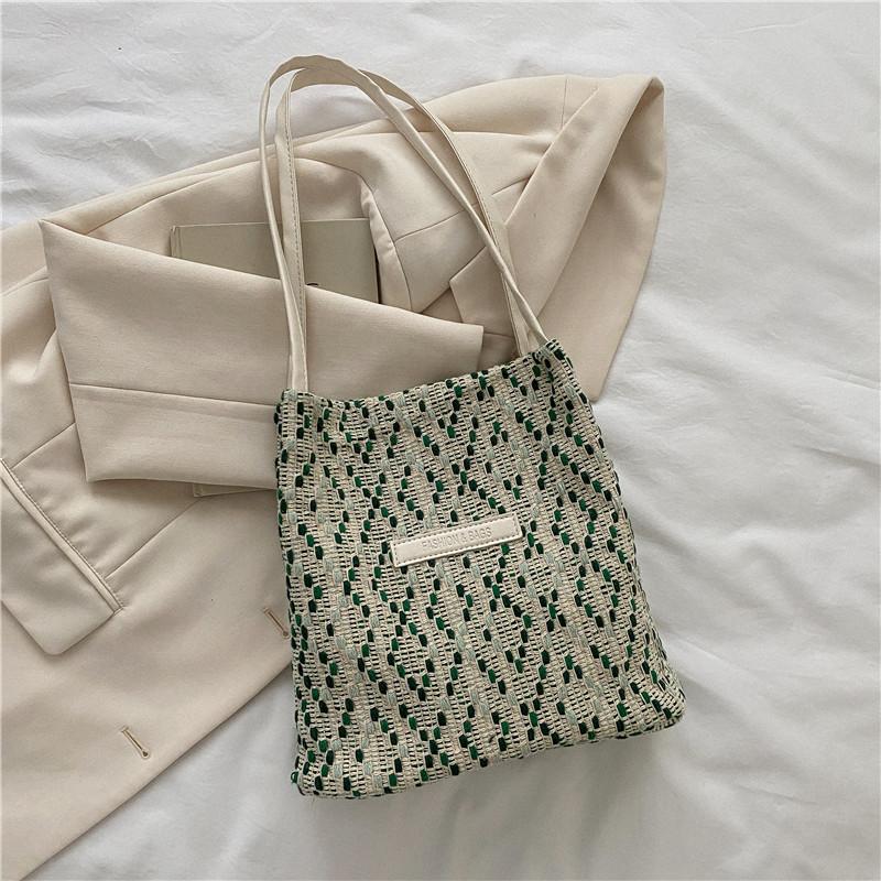 

Женская сумка 2025 новая летняя корейская версия на плечо сумка-тоут нишевый дизайн простая и универсальная легкая парусиновая сумка зелёный