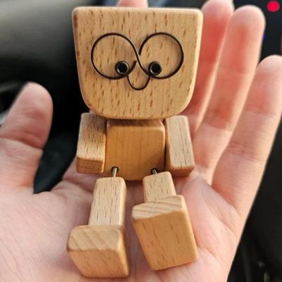 1 Set Schüttelnde Holzmann-Figur mit 12 Ausdrücken Handgefertigt Schüttelnde Füße Holzpuppe Auto-Armaturenbrett Desktop-Dekoration