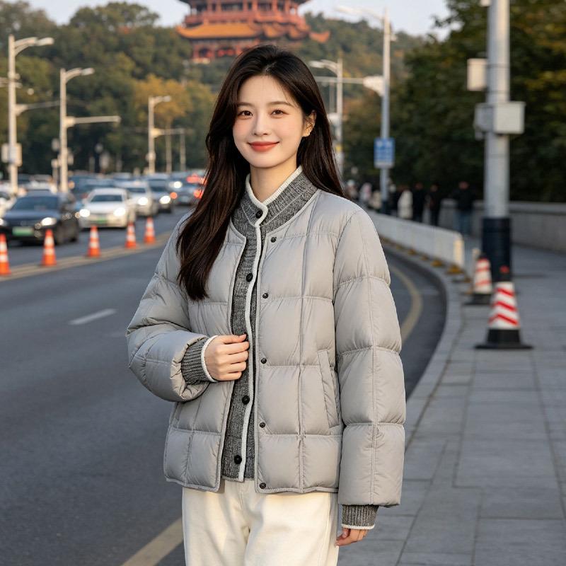 Down Jacket Women's Pinghu New Knitted Splicing Fake Two-piece Stand-up Collar Duck Down Fashion Coat