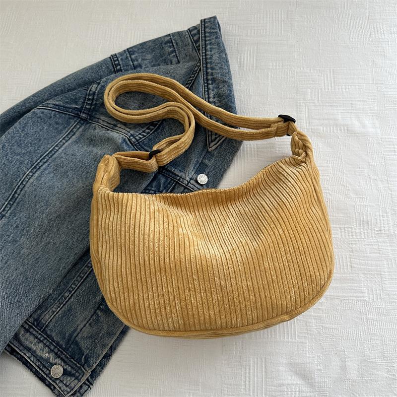 

Литературный вельвет ленивый ветер 2025 лето новая студенческая повседневная сумка простая сумка-пельмень