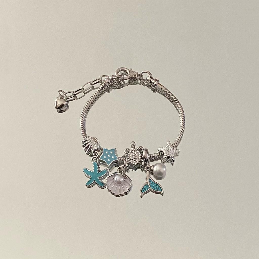 Ozean-Stil Perlenarmband mit Seestern- und Schildkröten-Anhängern für Unisex-Reisegeschenk