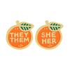 Alloy Brooch Depicting Lucky Orange Fruit Art with Pronoun THEY/THEM SHE/HER Lettering for Everyday Wear