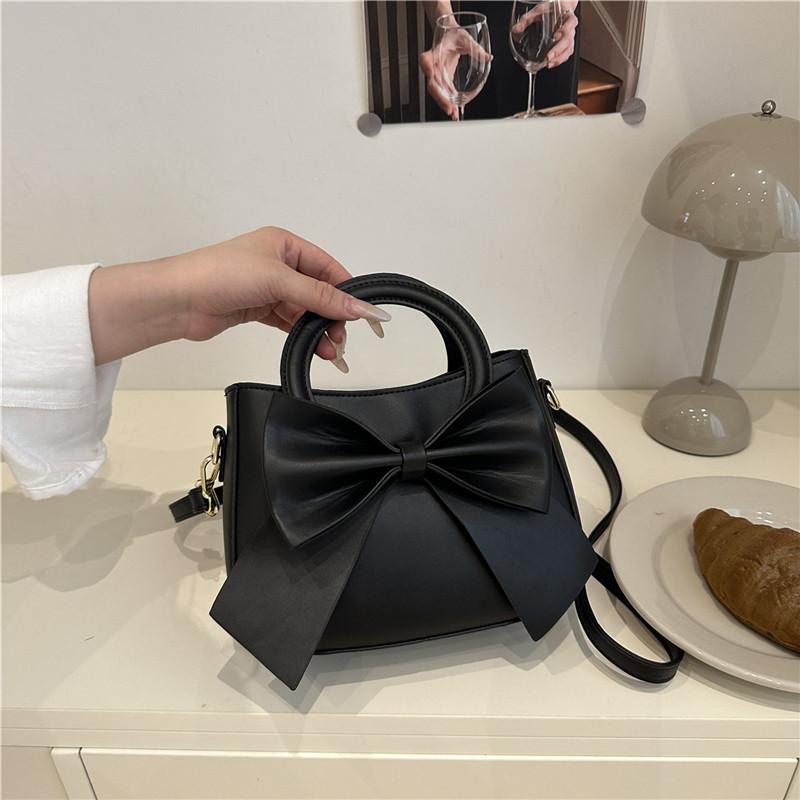 

Fashion solid color bow versatile small square bag women s personality casual autumn new high-end textured messenger bag чорний