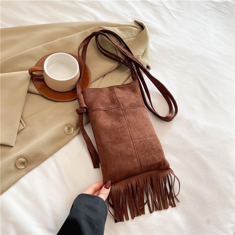 2025 new suede niche design new women's bag bohemian American fringed bag matte messenger