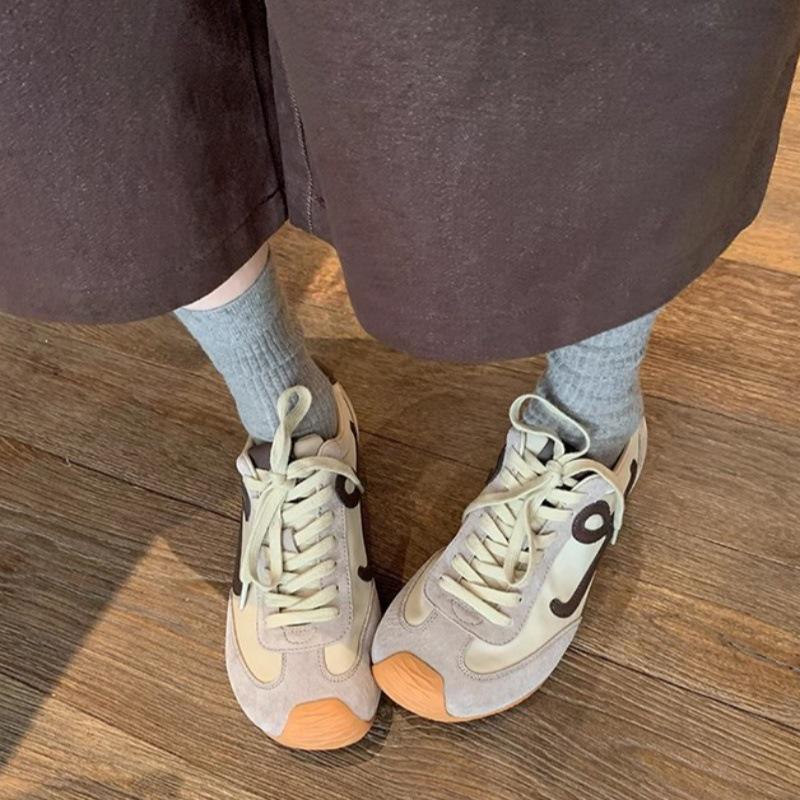 2025 Autumn Women's Retro Cowhide German Trainers with Asymmetrical Toe, Inner Lift, and Lace-up Design