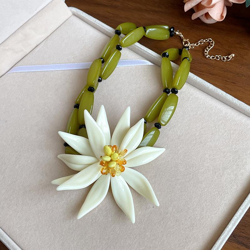 

Silver needle three-dimensional flower earrings summer beach vacation wind earrings women s exaggerated gentle temperament earrings accessories
