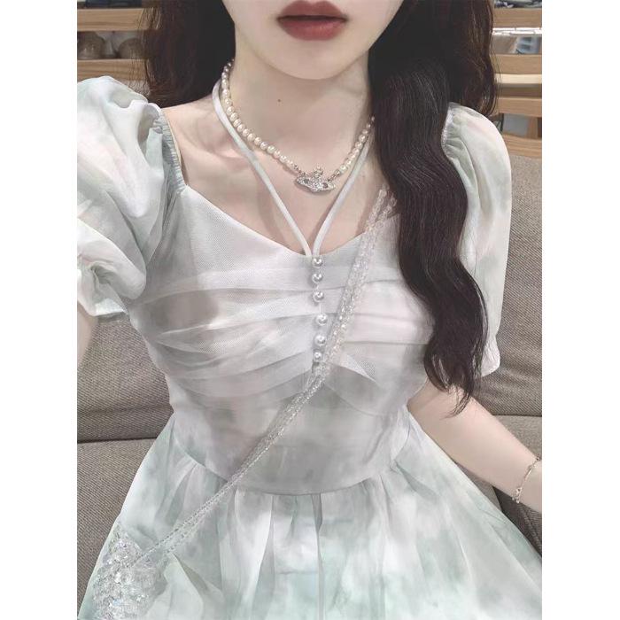 

Маленькое французское платье в цветочек - Элегантный летний стиль, подчеркивающий талию Medium