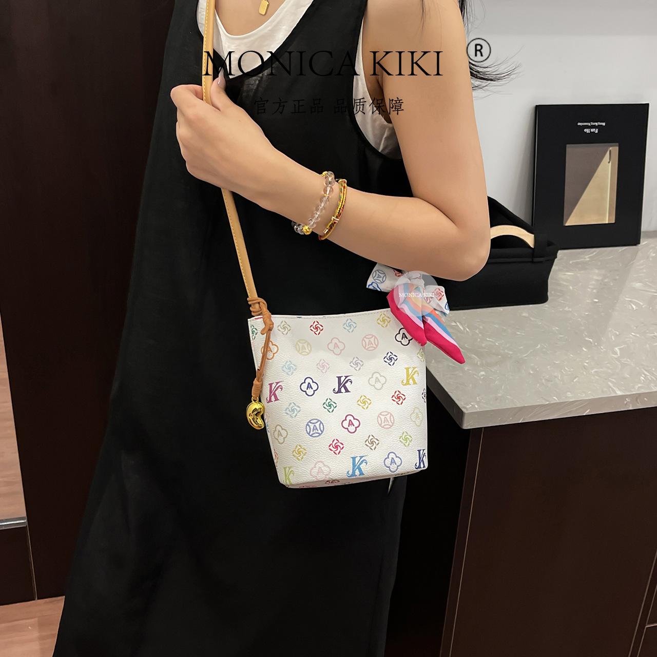 

Casual high-end textured women s bag 2025 summer new retro printed bucket bag simple trendy shoulder bag