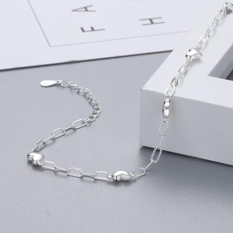 Dámský minimalistický náramek ve tvaru srdce - Nastavitelný a všestranný šperk