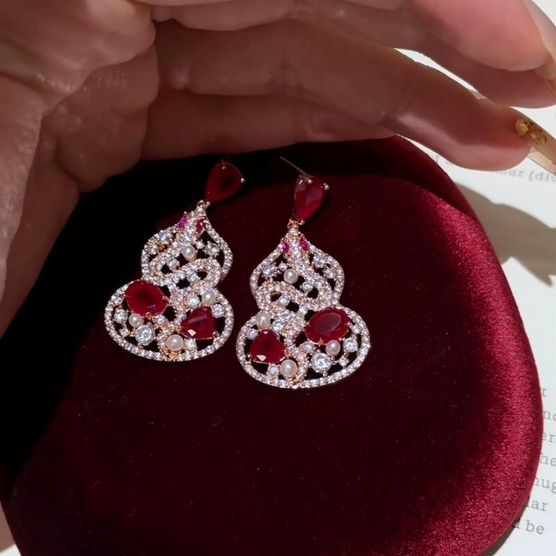 Silver needle ethnic style zircon empty gourd stud earrings new Chinese retro personality temperament earrings light luxury high-end earrings