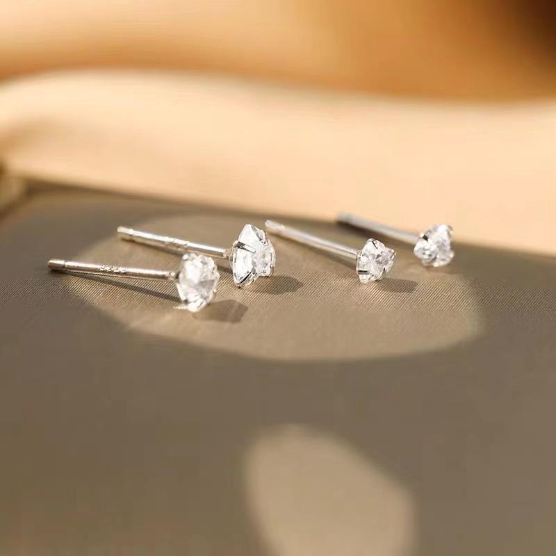 "Sterling Silver Heart-Shaped Zircon Earrings for Women - Simple, Elegant, and Luxurious."