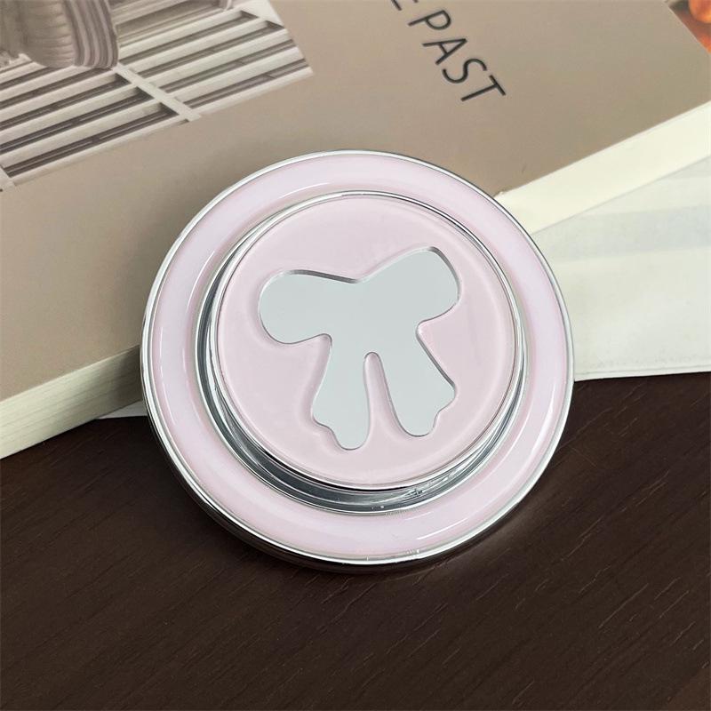 

ins Mirror Bow Magnetic Bracket: Strong Adsorption, Retractable Desktop Airbag, Compatible with MagSafe.