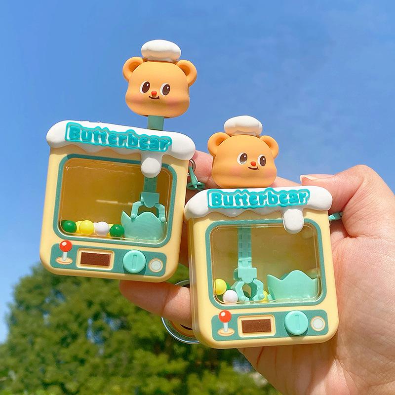 Butter Bear Keychain, Claw Doll Machine, Cartoon Toy, Exquisite Schoolbag, Pendant, Keychain.