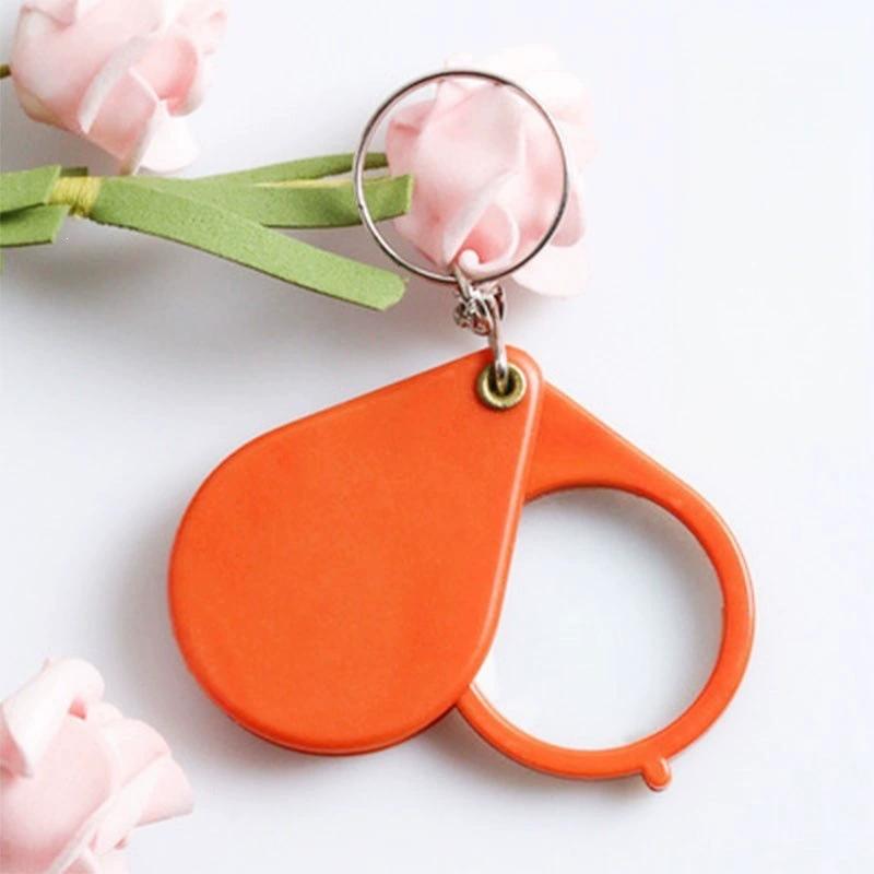 Portachiavi Lente d'Ingrandimento 10X Ingrandimento Pieghevole Portatile Mini Lente d'Ingrandimento con Anello Portachiavi per Lettura All'Aperto Rosso