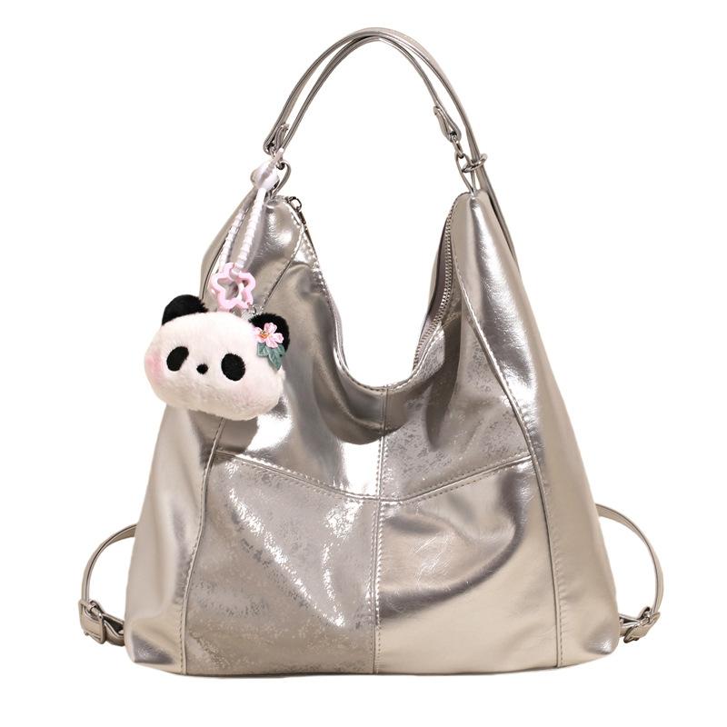 

Large capacity bag women s summer 2025 new fashion splicing multi-back casual shoulder crossbody niche tote bag серебряный