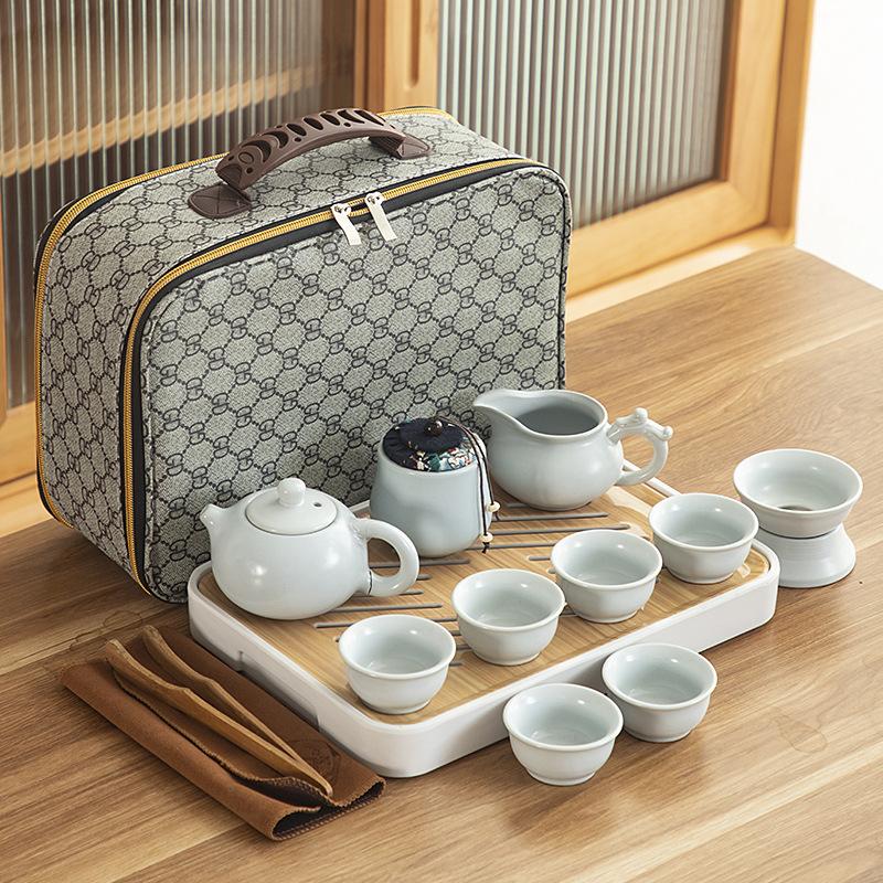 Travel ceramic Kung Fu tea set, tea tray, a full set of portable storage bags, practical business gifts for customers