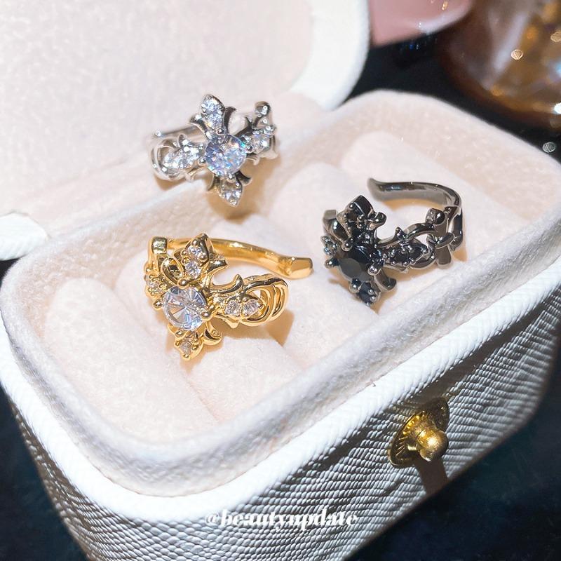 Sparkling zircon cross iris flower ear clip women's no ear piercing exquisite ear bone clip light luxury high-end versatile earrings