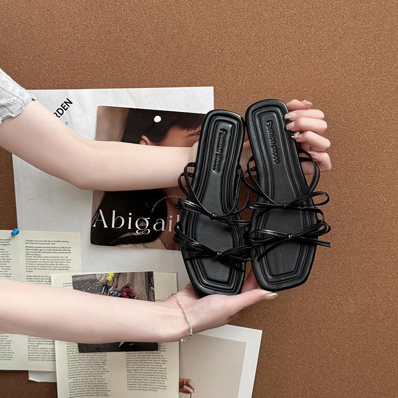 Stylish and simple versatile strap bow with open-toed cool slippers women's 2025 summer new flat-bottomed slippers