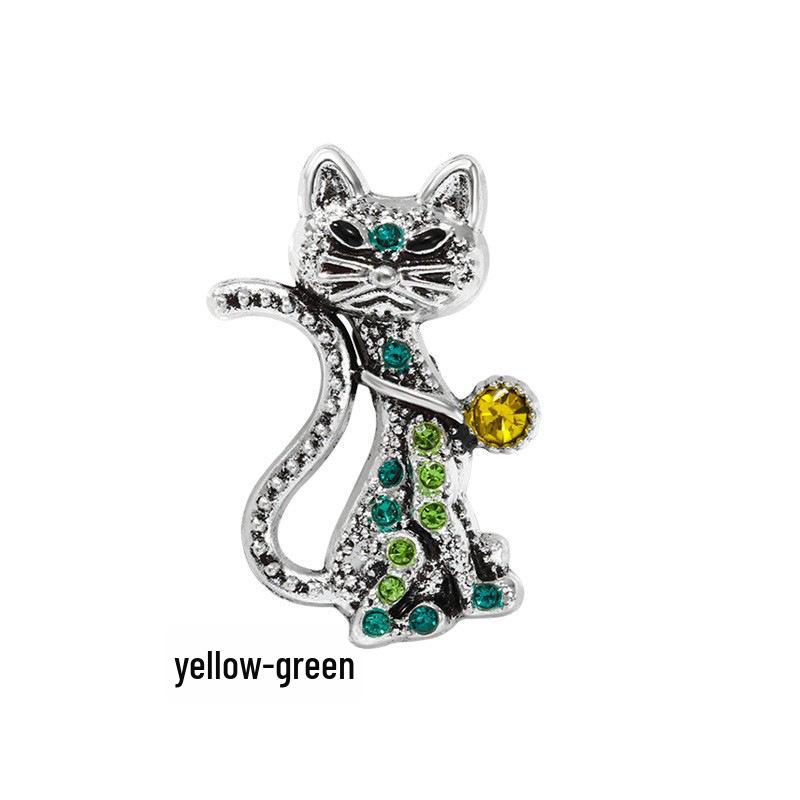 

Трендовая ретро-брошь в виде кошки — модный аксессуар высокого класса с разноцветными бриллиантами зелёный/жёлтый