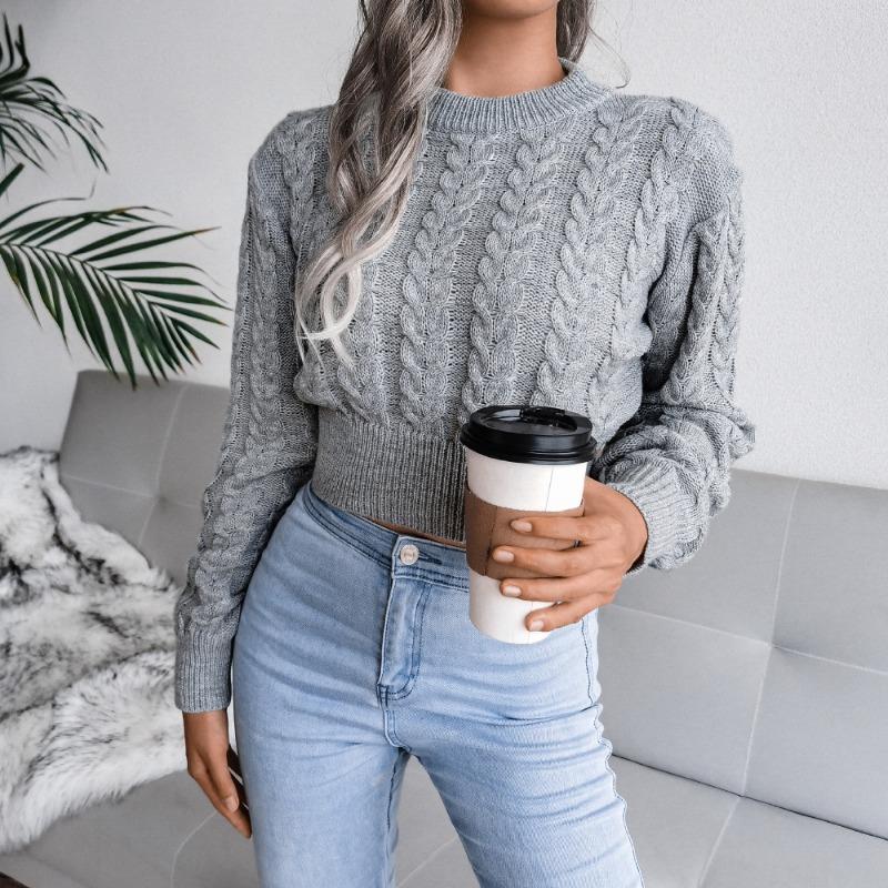 Autumn and winter new solid color twist knitted long-sleeved round neck pullover waist sexy spice sweater women