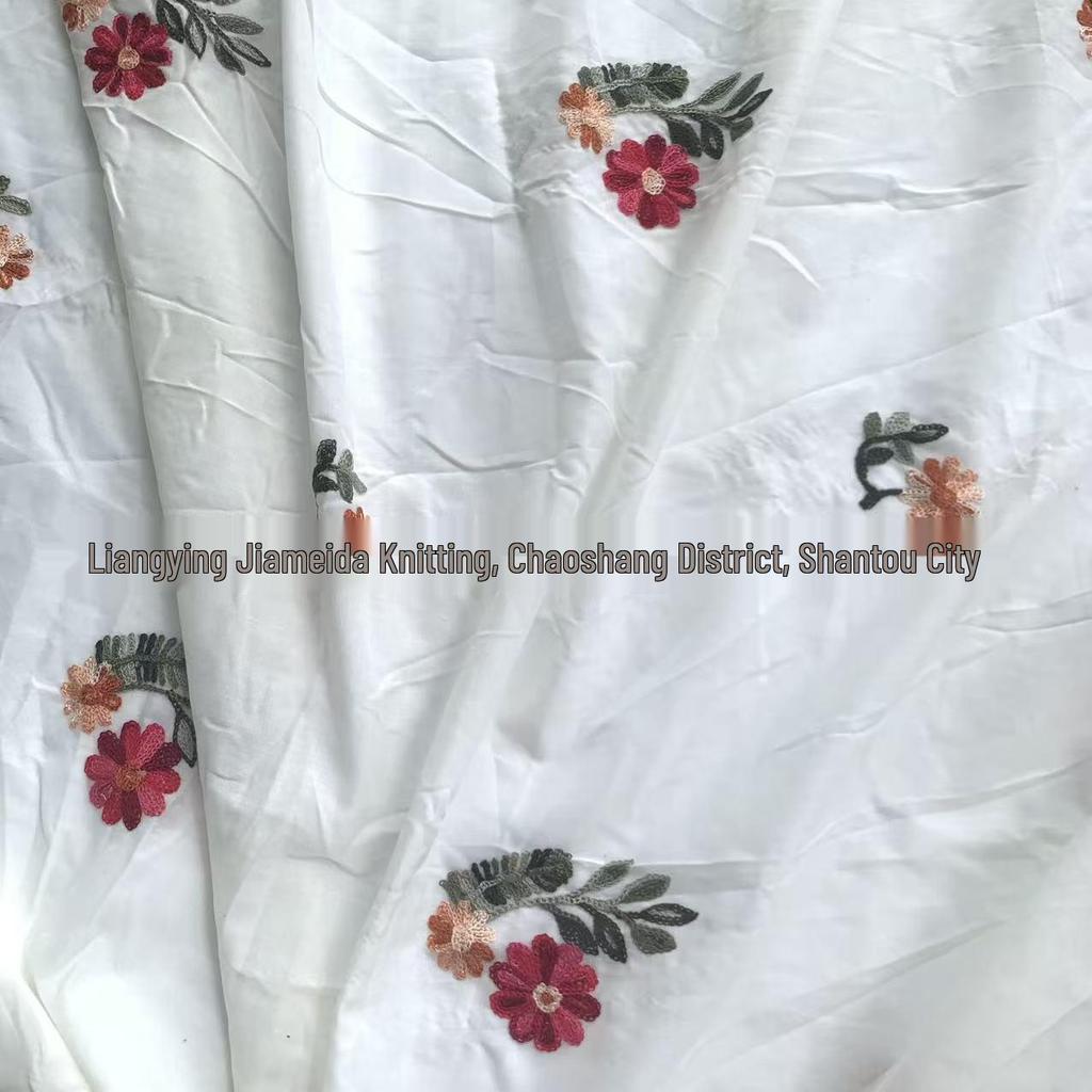 Damenbekleidung & Kinderhandtaschen: Helles Aprikot TC-Baumwolle mit bestickten kleinen Blumen