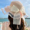 Chapeau de soleil élégant avec nœud en ruban et décoration en paille, style français, à large bord, pour voyage et plage, pour femmes