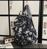 School bag large capacity multi-compartment tide cool junior high school students design sense versatile personality graffiti back