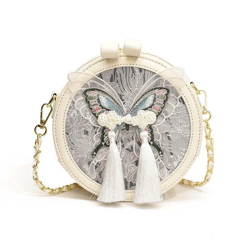 Chinese Fashion Small Round Pu Bag With Tassels And Internal Zipper Pocket For Women