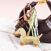 Colgante de Cuerda Tejida Dachshund y Amuleto de Cuero para Teléfono/Bolso