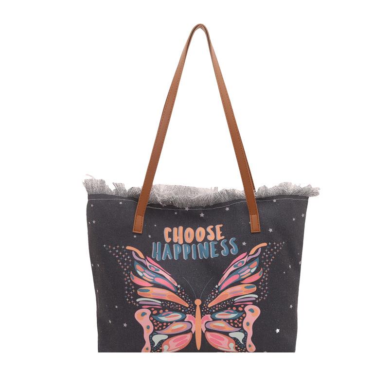 Niche printed bucket bag women s  new trendy cartoon graffiti shoulder messenger bag fashionable girl tote bag чёрный