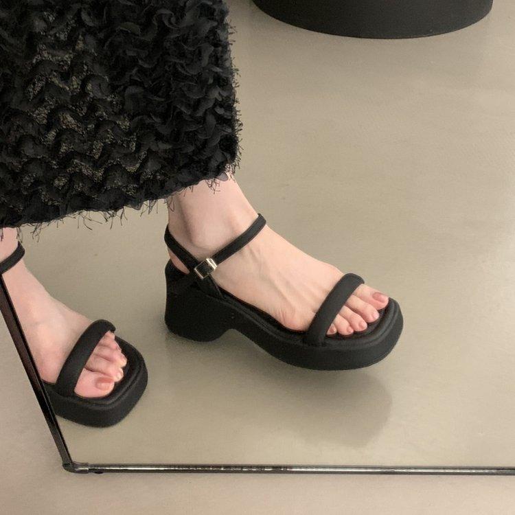 

thick-soled wedge sandals women s 2025 new summer wear with skirt black heel beach Roman sandals 35