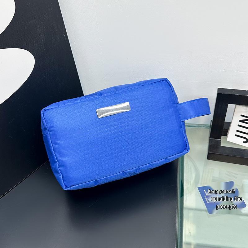 

Korean-Style Large Capacity Makeup and Travel Bag - Solid Color, Portable, Niche Design for Women синий