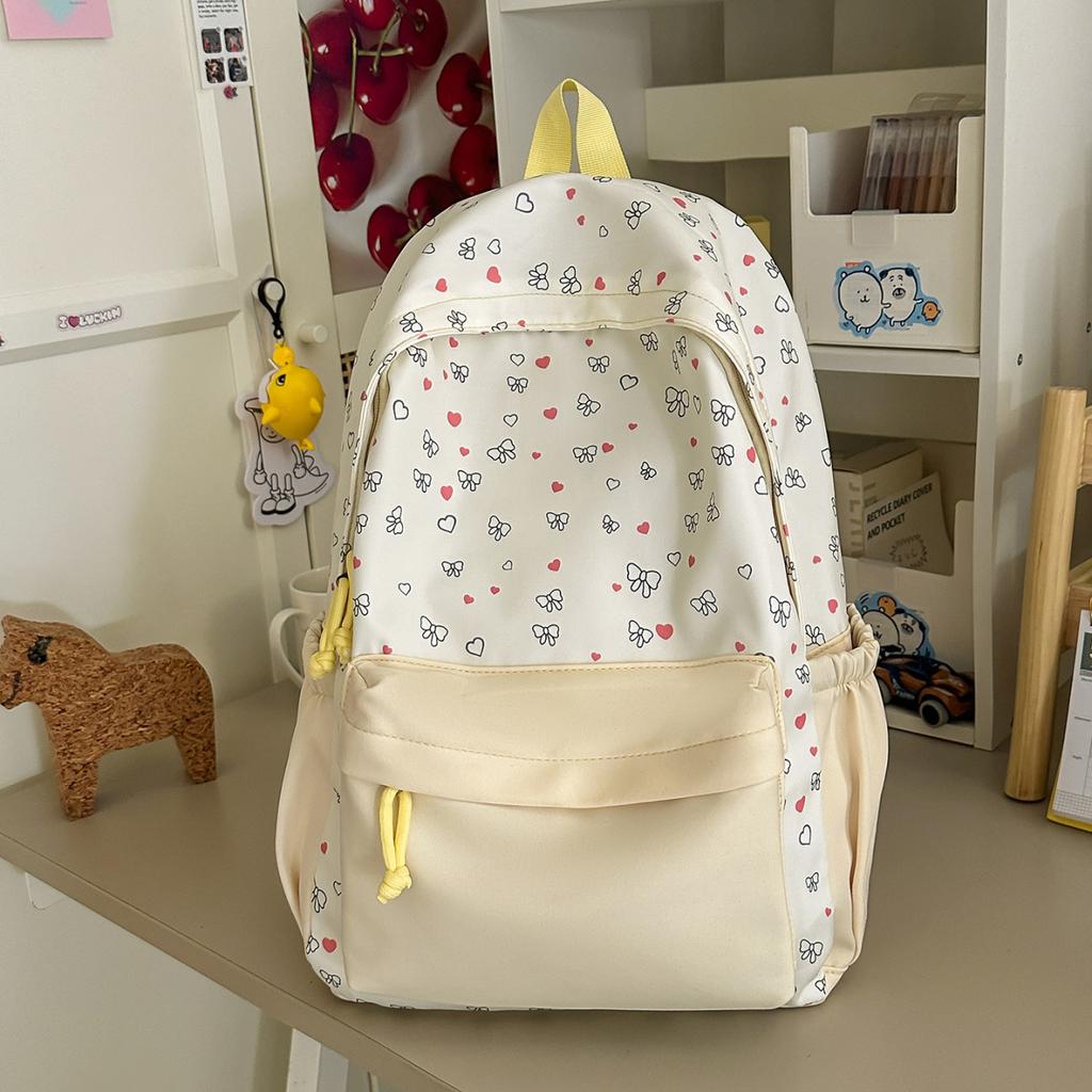 Schoolbag Junior high school bow high value niche 1011 new girl heart large capacity lightweight versatile backpack