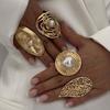 Übertriebene Metall-Ringe mit großer Perlenblume für Damen, Retro-Goldfarbe, unregelmäßige geometrische Kreisblatt-Öffnung, Fingerring-Schmuck