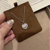 Vintage Heart Design: Women's Starburst Pendant Necklace with Clavicle Chain