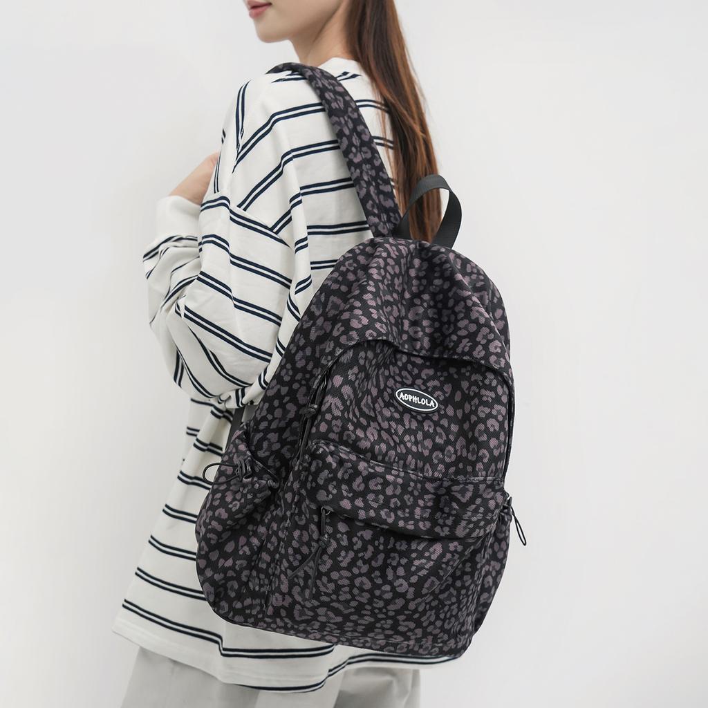 Zaino retrò con stampa leopardata zaino grande capacità moda tendenza strada coreana zaino versatile zaino per studente di scuola media